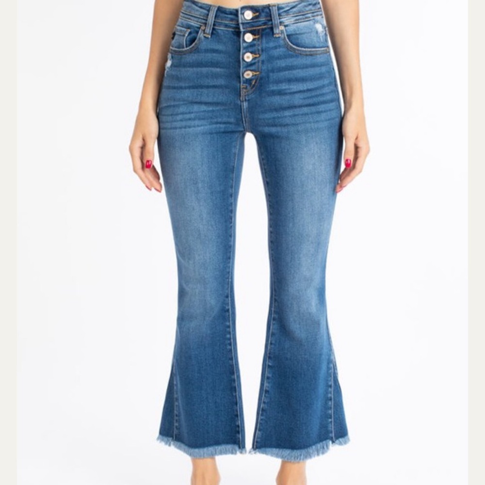 Cropped flair high waisted button fly jeans.